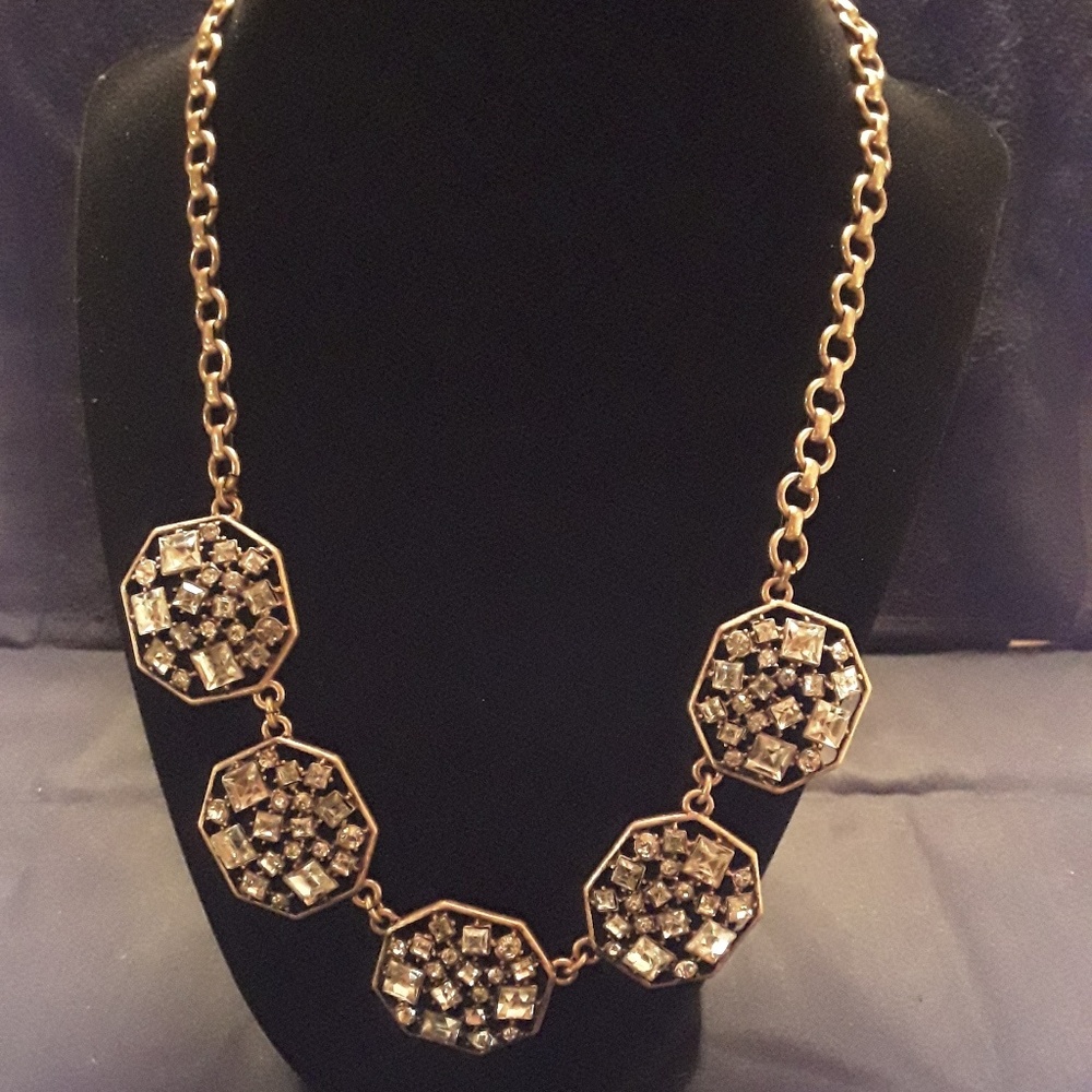 Gold tone necklace with cz